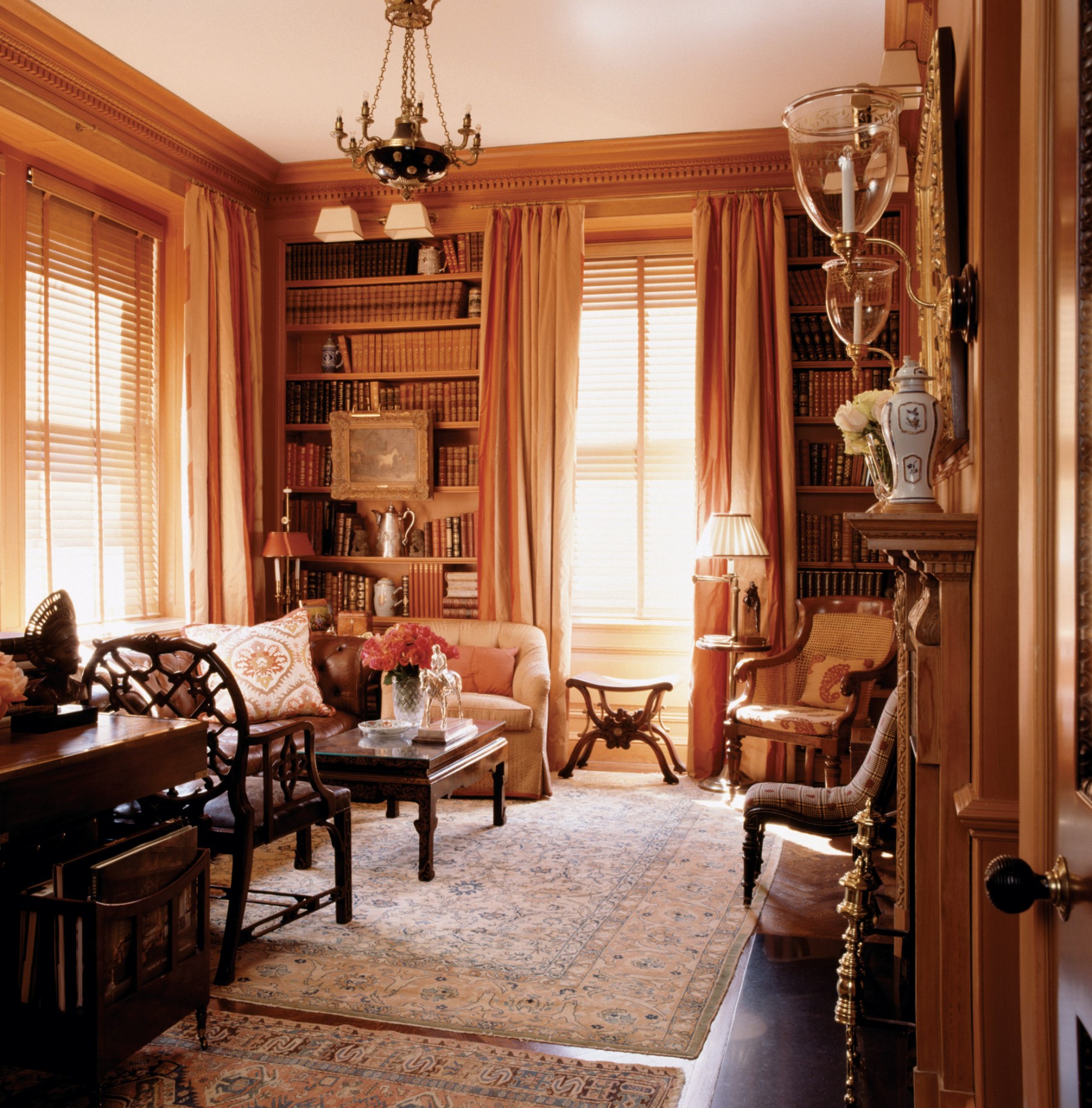 traditional library filled with art and antiques